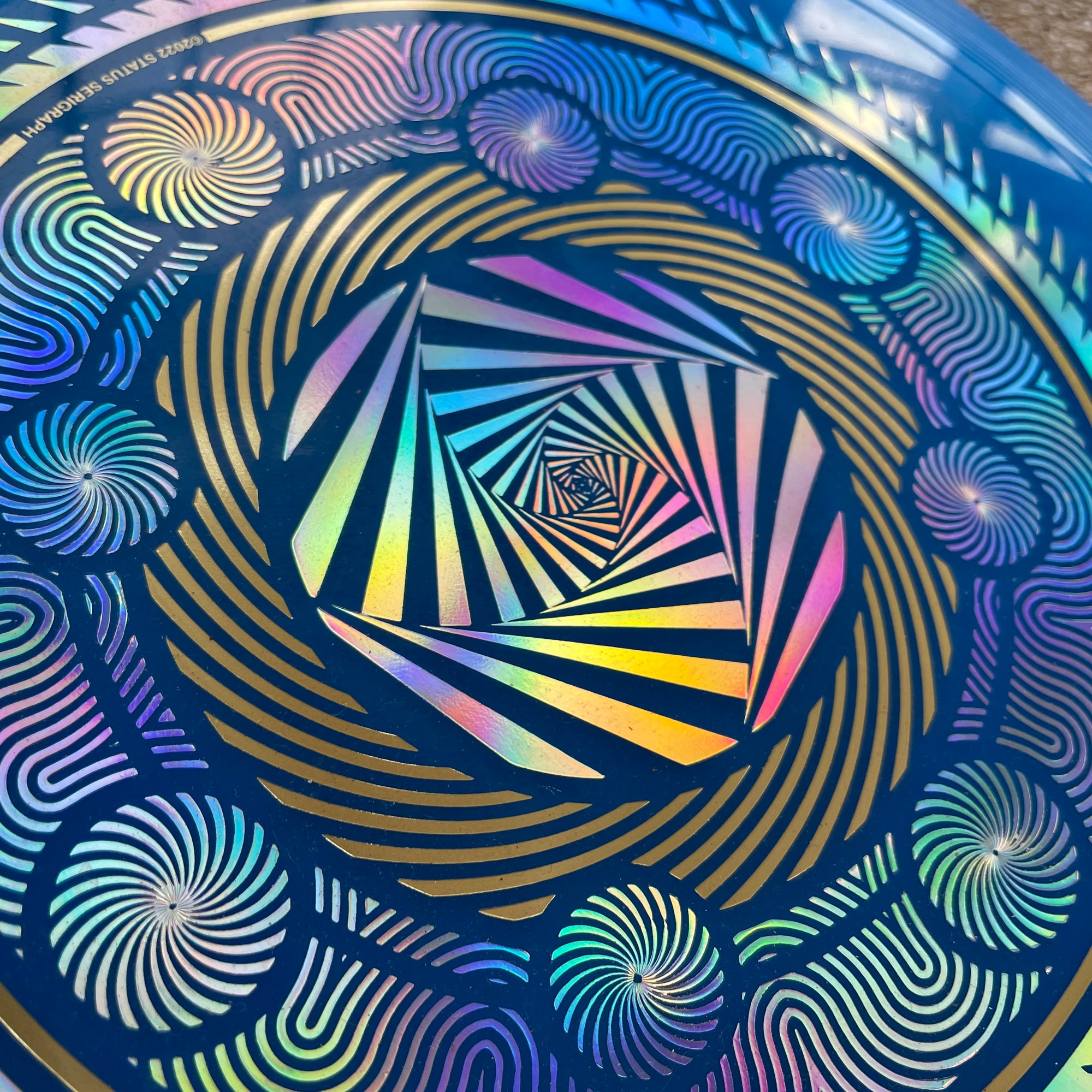 Holographic Vortex Frisbee